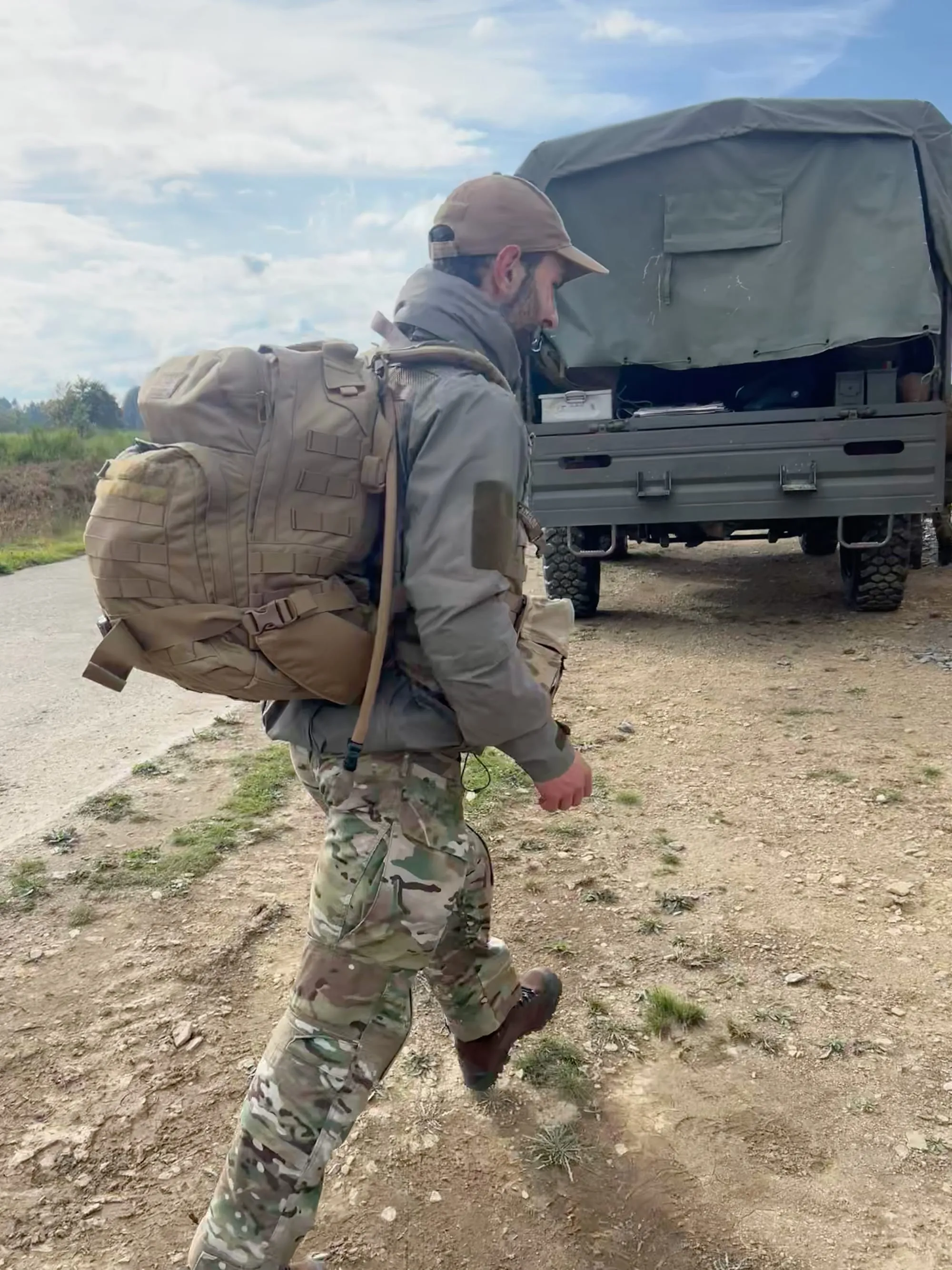 Military field exercise with rucksack
